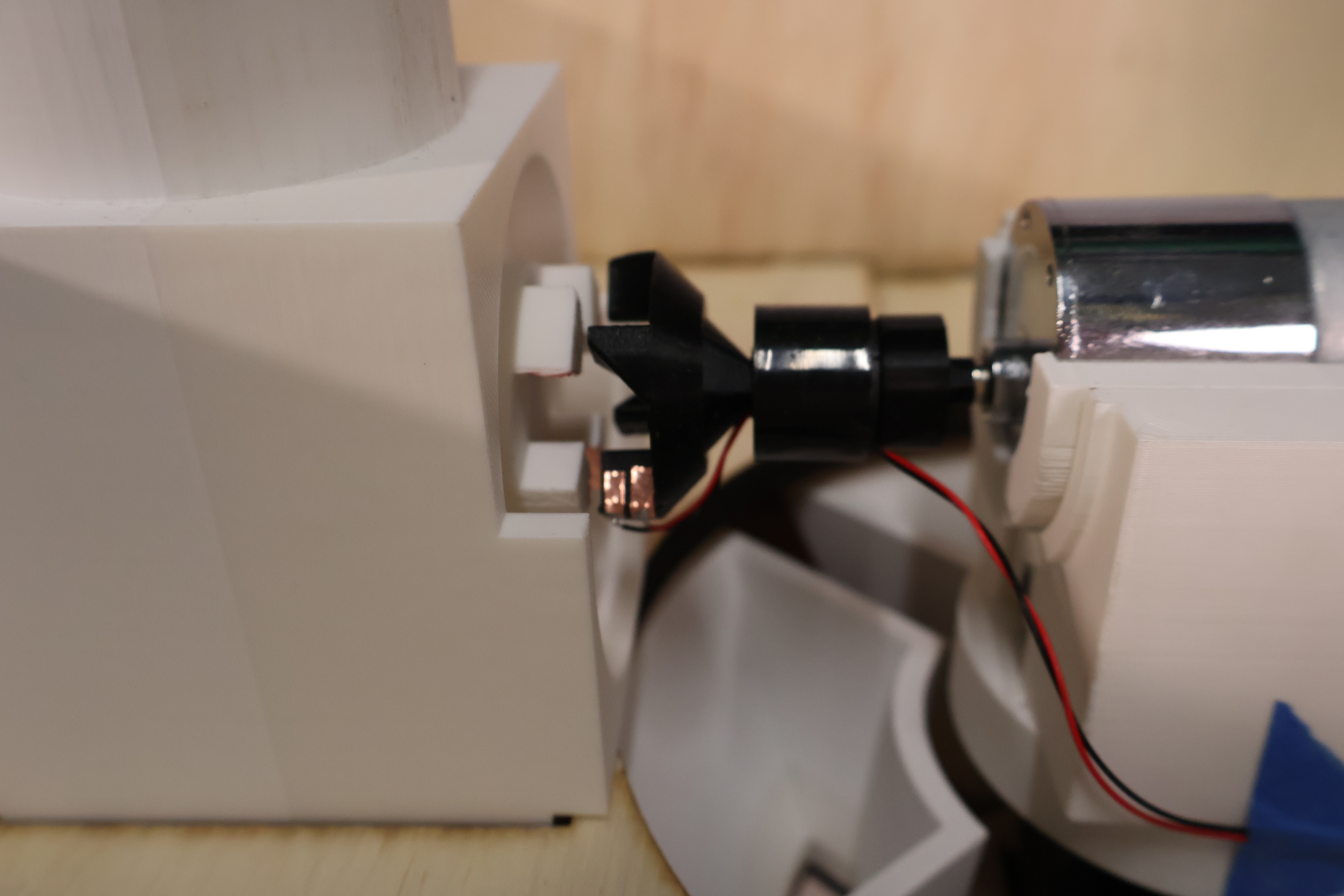 Measurely — side view showing auger and key